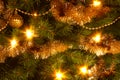 Golden Glow Shining Christmas Tree with Sparkling Glitter Royalty Free Stock Photo