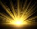 Golden glow of sun rays. Yellow light isolated on black background. Golden bright sunlight, transparent starburst