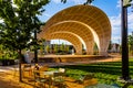 Golden glow of sunrise on the performance pavilion Gene Leahy Mall Omaha Nebraska USA.