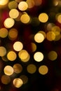 Golden glowing bokeh background. Abstract bright led light backgdrop. Defocused image Royalty Free Stock Photo