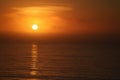 Golden glowing sunset on the Pacific Ocean in California Royalty Free Stock Photo