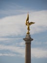 Golden goddess statue on the pole