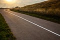 Golden grass. Blue sky over empty asphalt road during S Royalty Free Stock Photo