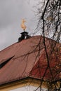 Golden Guardian: The Bavarian Church Rooftop in Nature\'s Embrace Royalty Free Stock Photo
