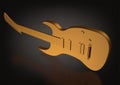 Golden guitar on a black
