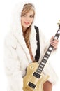 Golden guitar girl in fur Royalty Free Stock Photo