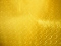 Golden hairline stainless. Shiny gold foil metal light line pattern surface texture. Close-up of interior material wall for design Royalty Free Stock Photo