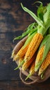 A golden harvest isolated corn on a textured wooden background