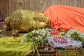 Golden Head of Reclining Buddha Statue on the side of  Parinirvana Temple in Kushinagar, Royalty Free Stock Photo