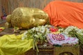 Golden Head of Reclining Buddha Statue on the side of  Parinirvana Temple in Kushinagar, Royalty Free Stock Photo