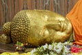 Golden Head of Reclining Buddha Statue on the side of  Parinirvana Temple in Kushinagar, Uttar Pradesh  India Royalty Free Stock Photo
