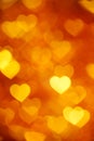 Golden heart bokeh background photo, abstract holiday backdrop Royalty Free Stock Photo