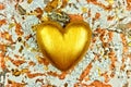 A golden heart on a bronze background Royalty Free Stock Photo