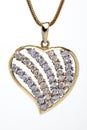 Golden heart shaped necklace with stones