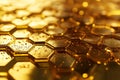 Golden hexagonal metallic surface with reflective texture and bokeh background Royalty Free Stock Photo