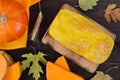 Golden homemade freshly baked pumpkin bread with sesame seeds