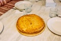 Golden homemade pie on the table