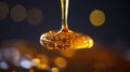 Golden Honey Dripping Against Dark Bokeh Background Royalty Free Stock Photo