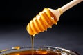 Golden honey drips from a wooden spoon, pure liquid sweetness