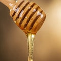 Drizzles from a wooden honey dipper showcasing its viscous texture Royalty Free Stock Photo
