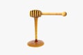 Golden honey drop from honey dipper, 3d rendering Royalty Free Stock Photo