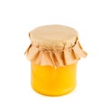 Golden honey in a jar isolated on a white background Royalty Free Stock Photo