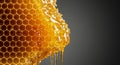 Golden honeycomb with glistening, translucent honey dripping from hexagonal cells