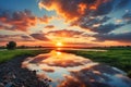 Golden Horizons: Beautiful Sunset Landscape with Reflection in Water, Greenery, Sky, and Clouds