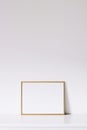 Golden horizontal frame on white furniture, luxury home decor and design for mockup creation