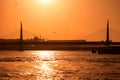 Golden Horn Bridge with the Yavuz Selim Mosque on the background at sunset. Istanbul. Turkey