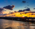 Golden horn, Istanbul, Turkey; view of the Ataturk bridge on a cloudy evening during sunset. Beautiful dramatic cloudscape in the