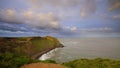 Golden hour morning light on the coast and cliffs near Hartland Point Royalty Free Stock Photo