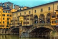 Golden hour at the Ponte Vecchio a medieval stone closed-spandrel segmental arch bridge over the Arno River in Florence Royalty Free Stock Photo