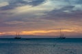 The Golden hour with sail boats on sea anchored