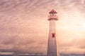 Golden hour shot of Wawatam lighthouse at the harbor of St. Ignace, Michigan in the Straits of Mackinac Royalty Free Stock Photo