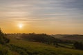 Golden hour during sunrise over the rolling hills of the Dutch province of Limburg near the village of Fromberg Royalty Free Stock Photo