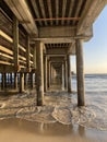 Golden Hour Sunset at the Beach Under a Pier in Santa Monica, California Royalty Free Stock Photo