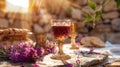 Golden hour wine and flowers still life Royalty Free Stock Photo