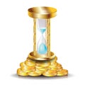 Golden hourglass on pile of coins