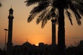 Golden Hours sunset with Mosque and palm Royalty Free Stock Photo