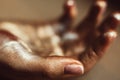 Golden human palm close-up