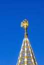 Golden imperial Russian eagle on spire of famous Cathedra