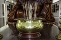 The golden incense pot the Maha Vihara Duta Maitreya Temple in Batam Island