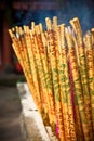Golden incense sticks in chinese temple