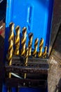 Golden incomplete set of metal drill bits