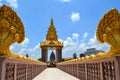 Golden Independence monument, Naga bridge walk way through the monument with beautiful clouds and blue sky background, Ta Keo, Cam