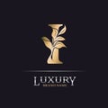 Golden Initial Letter I. Elegant design letter I with floral branch. Luxury Gold Logo Icon. Vintage alphabet concept with floral