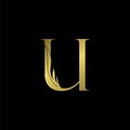 Golden Initial Letter U logo icon, simple vector design concept wing with letter Royalty Free Stock Photo