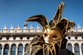 Golden jester mask at Venice Carnival Royalty Free Stock Photo