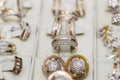 Golden jewellery collection on shop showcase close up Royalty Free Stock Photo